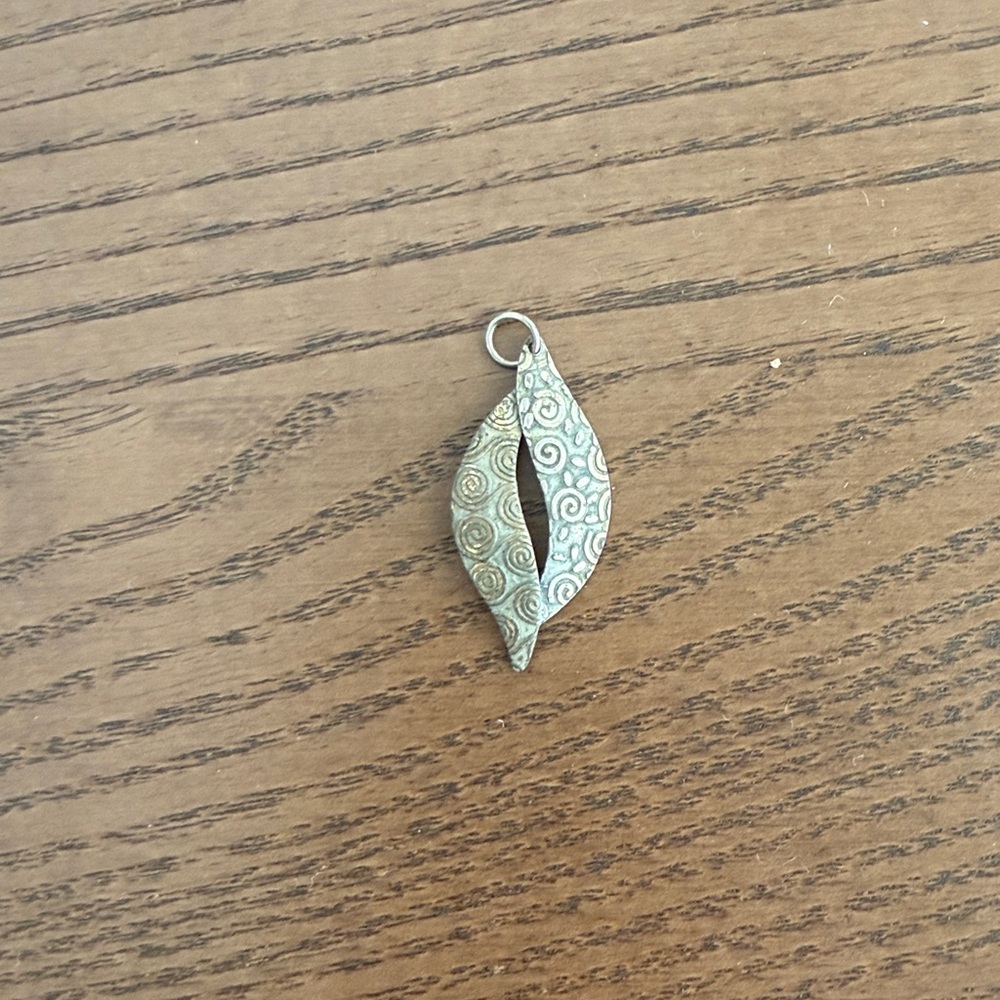 Mixed hammered metal pendant